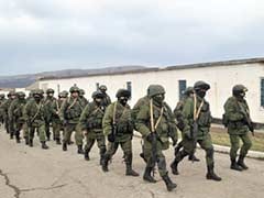 Crimean militias storm bases, arrest Ukraine navy chief