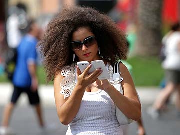 Texting and walking more dangerous than texting while driving
