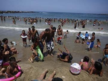 Tired of protests, Venezuelans take politics to the beach