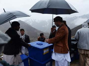 Afghans vote in presidential election as US troops exit