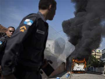 Armed attackers burn 34 buses in Sao Paulo suburb