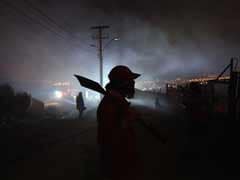 Fires still besiege Chile port; 15 dead, 500 hurt