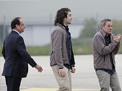 Four French journalists home after long Syrian ordeal