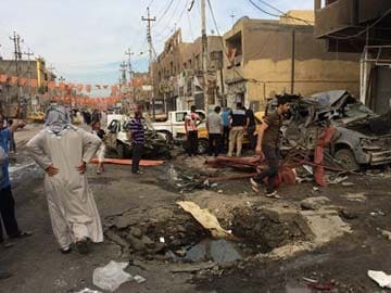 Bombs kill four in shopping street of Iraqi capital 