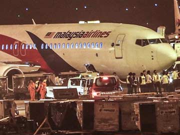 Passengers aboard Malaysia Airlines jet hail pilot as hero