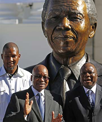 South Africa celebrates Mandela, 20 years of democracy ahead of polls