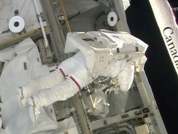 United States astronauts step out on spacewalk for repairs