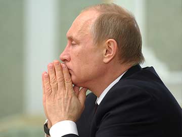 Vladimir Putin warns West over restive Ukraine