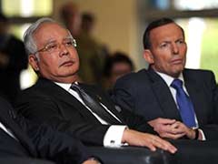 Malaysian PM in Perth as Australia says search will go on for missing jet