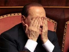 Former Italian Premier Silvio Berlusconi hospitalized with inflamed knee