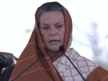 Sonia Gandhi takes on Narendra Modi on his turf