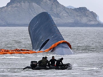 Korea ferry captain defends actions, bodies seen in ship