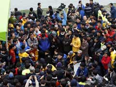 Sunken Korea ferry relatives give DNA swabs to help identify dead
