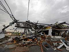 Tornadoes tear through south of US, adding to death toll