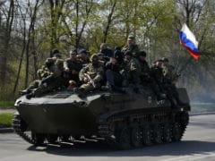 Pro-Russia separatists take armoured vehicles, humiliating Kiev forces