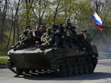 Pro-Russia separatists take armoured vehicles, humiliating Kiev forces