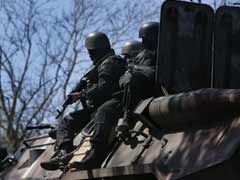 Sanctions loom as observers held in east Ukraine