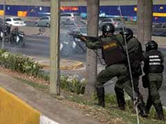 Scores of Venezuelans march against government