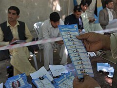 Afghan preliminary election results due as run-off looms