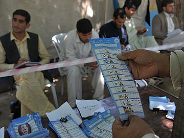 Afghan preliminary election results due as run-off looms