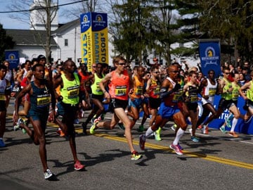 Runners reclaim Boston Marathon one year after attacks