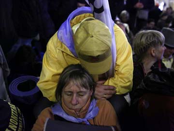 Huge crowd gathers for historic canonisation of two popes