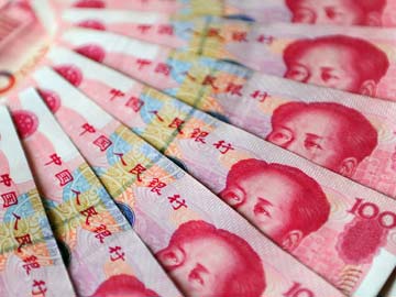 US warns China its currency is still undervalued