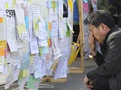 South Korea ferry toll hits 159 as relatives wait