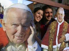 Historic canonisation of two popes brings joy and controversy