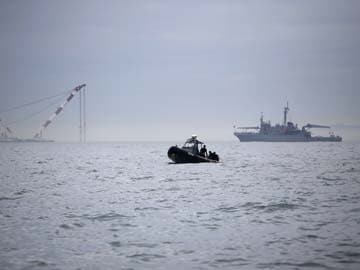 South Korean divers spot three more bodies: coastguard