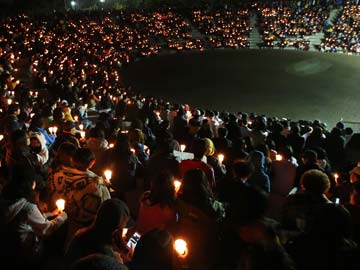 As identification continues of South Korea ferry victims, families cling to hope