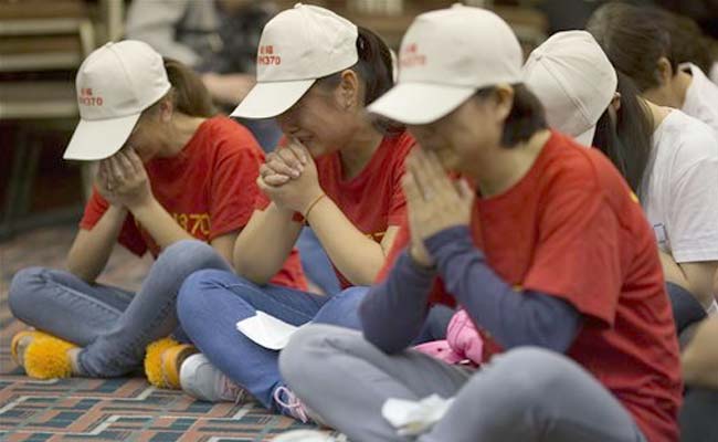 Malaysia asks world to 'pray hard' for missing plane clue 