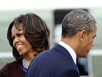 The Obamas earned $500,000 last year but income drops