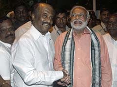 Wish Modi well, says Rajinikanth with a hug