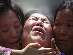 As Nepali sherpa families cremate Everest avalanche victims, anger grows
