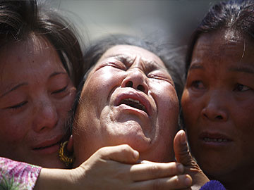 As Nepali sherpa families cremate Everest avalanche victims, anger grows