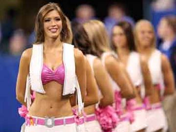 NFL cheerleader says she was fired over Instagram photo - BBC News