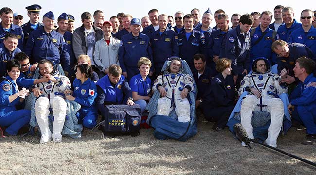 Three astronauts land back on Earth in Soyuz capsule