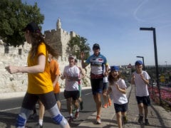 Australian Completes 'Mideast Peace Run' in Jerusalem