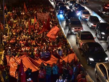 Brazil hit by new pre-World Cup strikes, protests