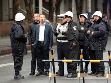 Attacked China Market Under tight Security as Shoppers Return