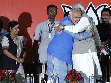 Election Results 2014: From Advani, Flowers and a Hug for Modi