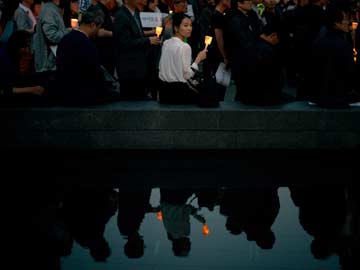 Korean Ferry Recovery Suspended for Third Day