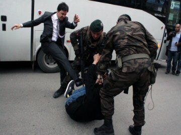 Turkey Outraged as Prime Minister's Aide Kicks Protester