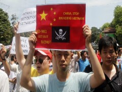 Vietnam Stops Anti-China Protests After Deadly Riots, China Evacuates