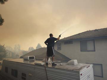 Firefighters Hold Line Against Fierce Southern California Wildfire