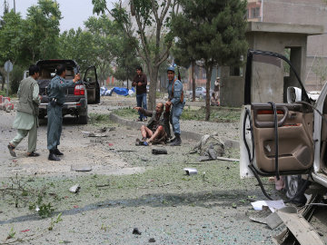 Afghanistan: Bombers Hit Base in East, Kill Guard