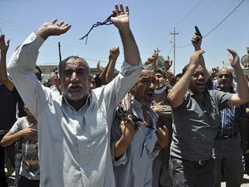 Embattled Iraqi Turkmen Take Up Arms Against Militants