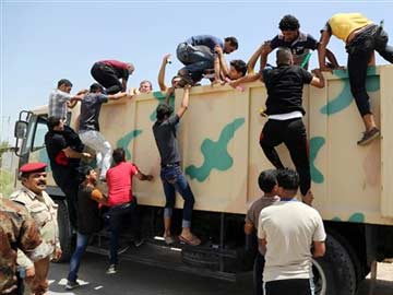 Iraqis Seek Shelter from Battles and Privation	