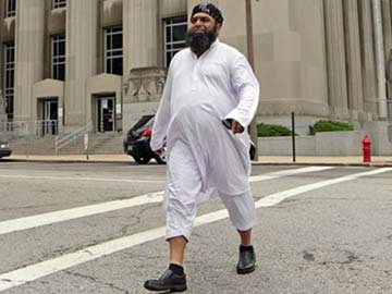 Muslim Driver Fights US City's Taxi Wardrobe Rules 